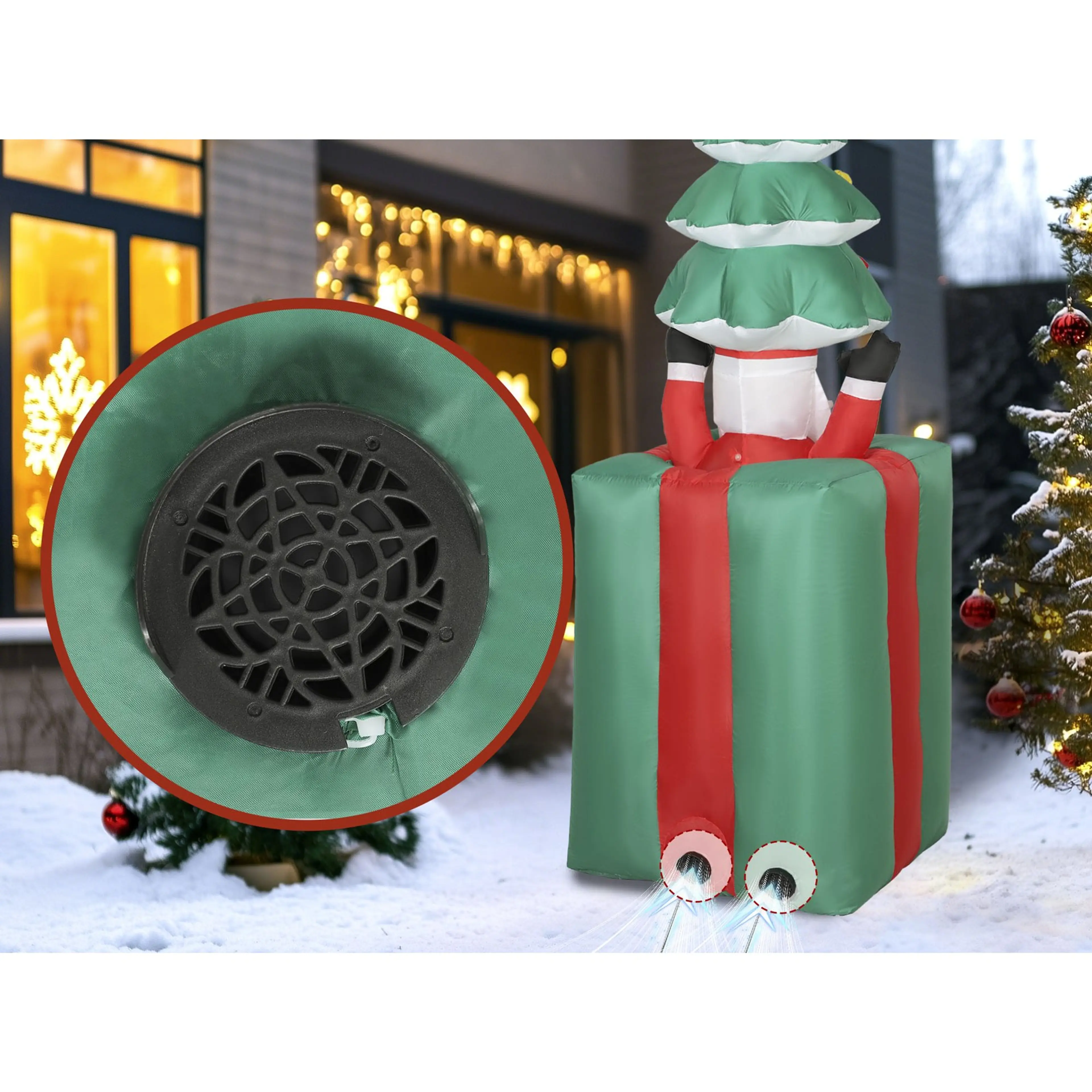 Närbild på det inbyggda fläktgallret i sockeln som håller juldekorationen uppblåst
