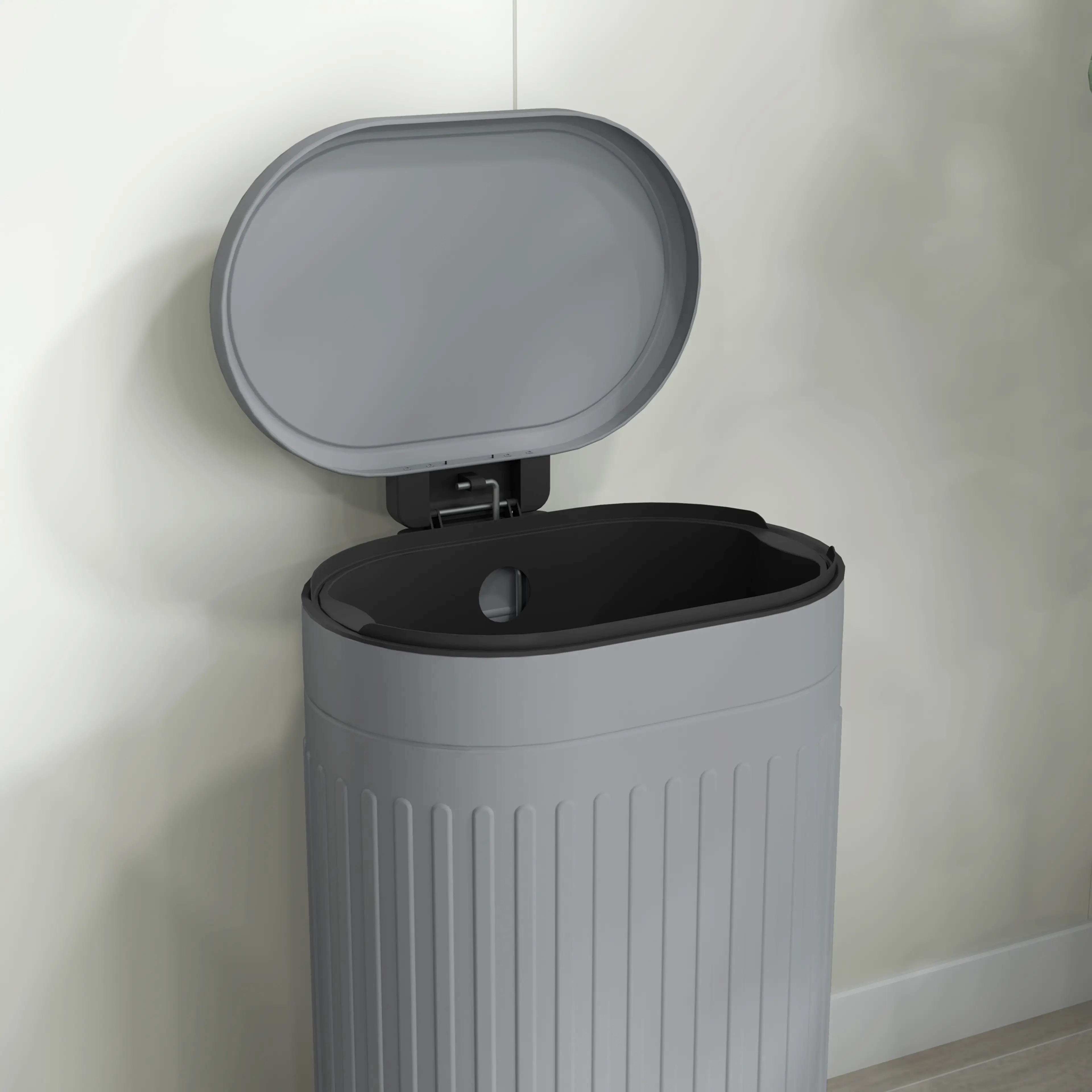 Närbild på tunnan med locket öppet och innerhinken synlig