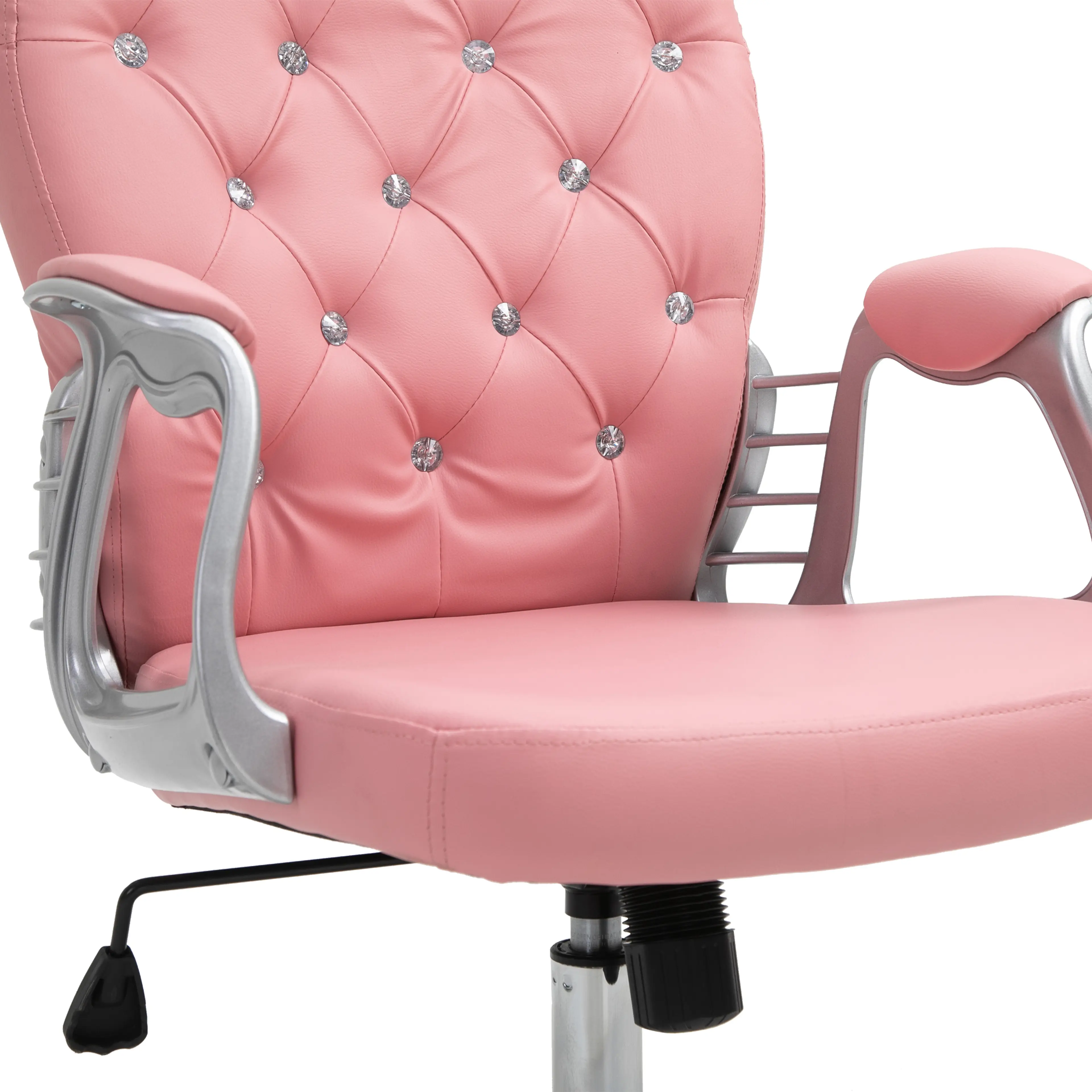 Närbild på armstödet och sitsen i rosa konstläder