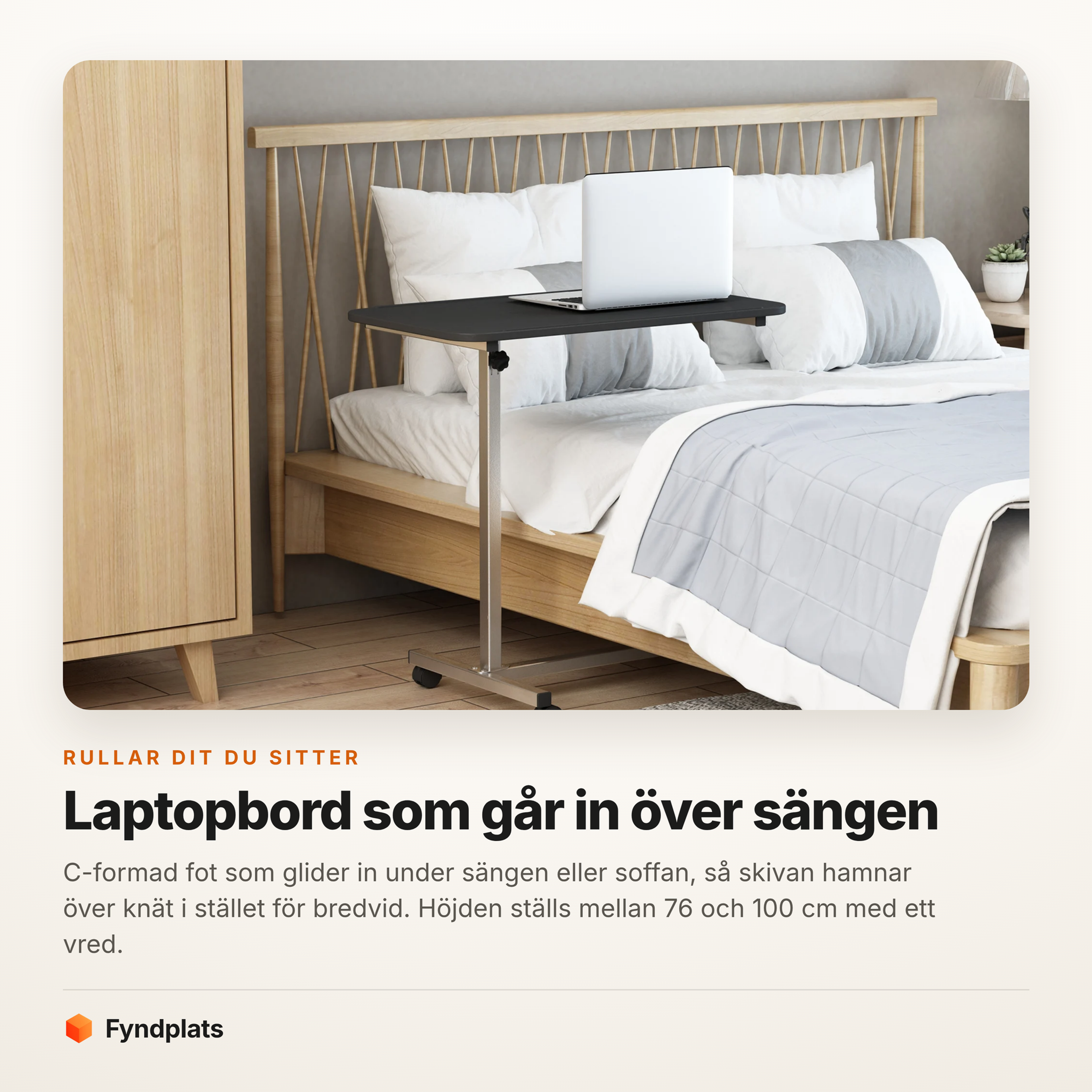 Bordet inskjutet över sängen med en laptop på skivan