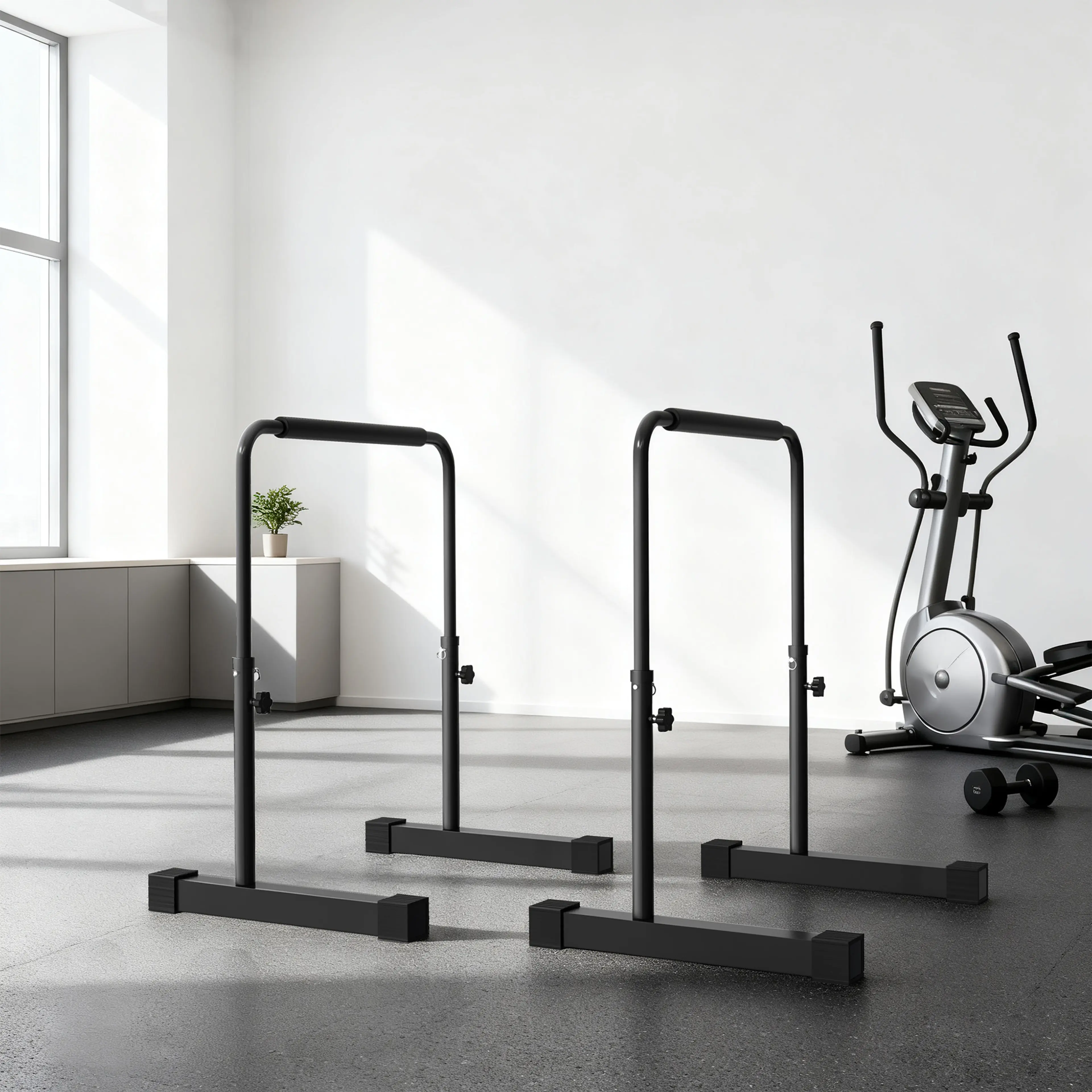 Dipsställningen i ett ljust hemmagym bredvid en crosstrainer
