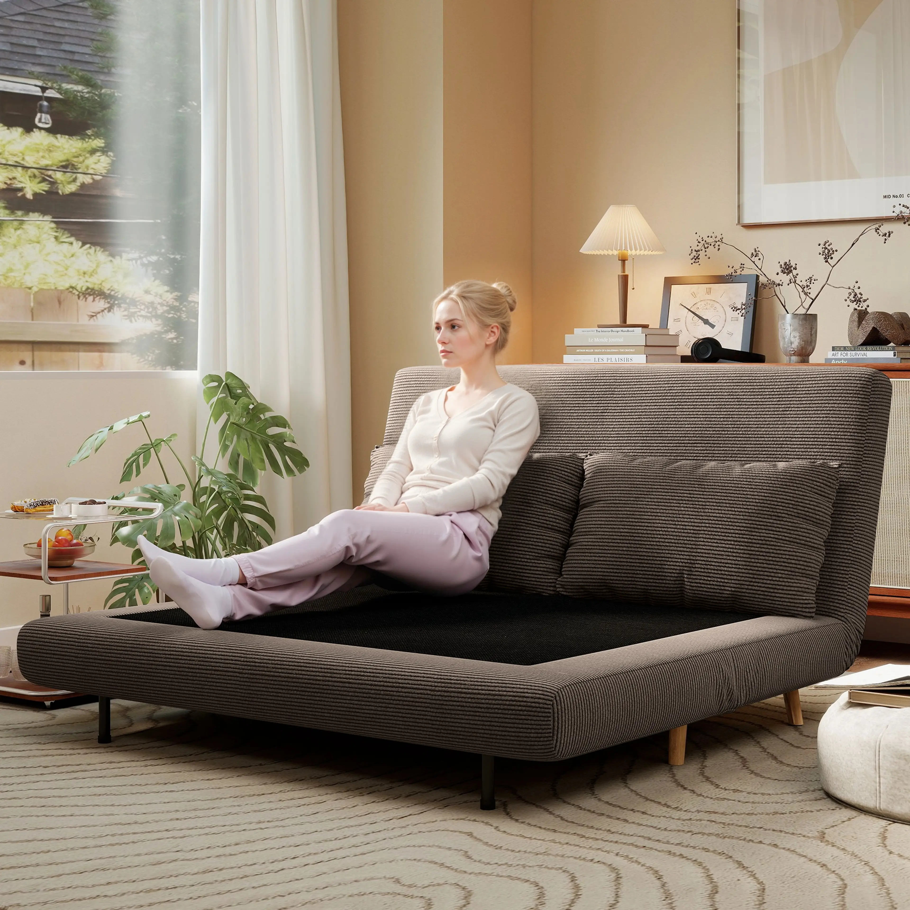 Soffan helt nedfälld till bädd på 191 × 141 centimeter