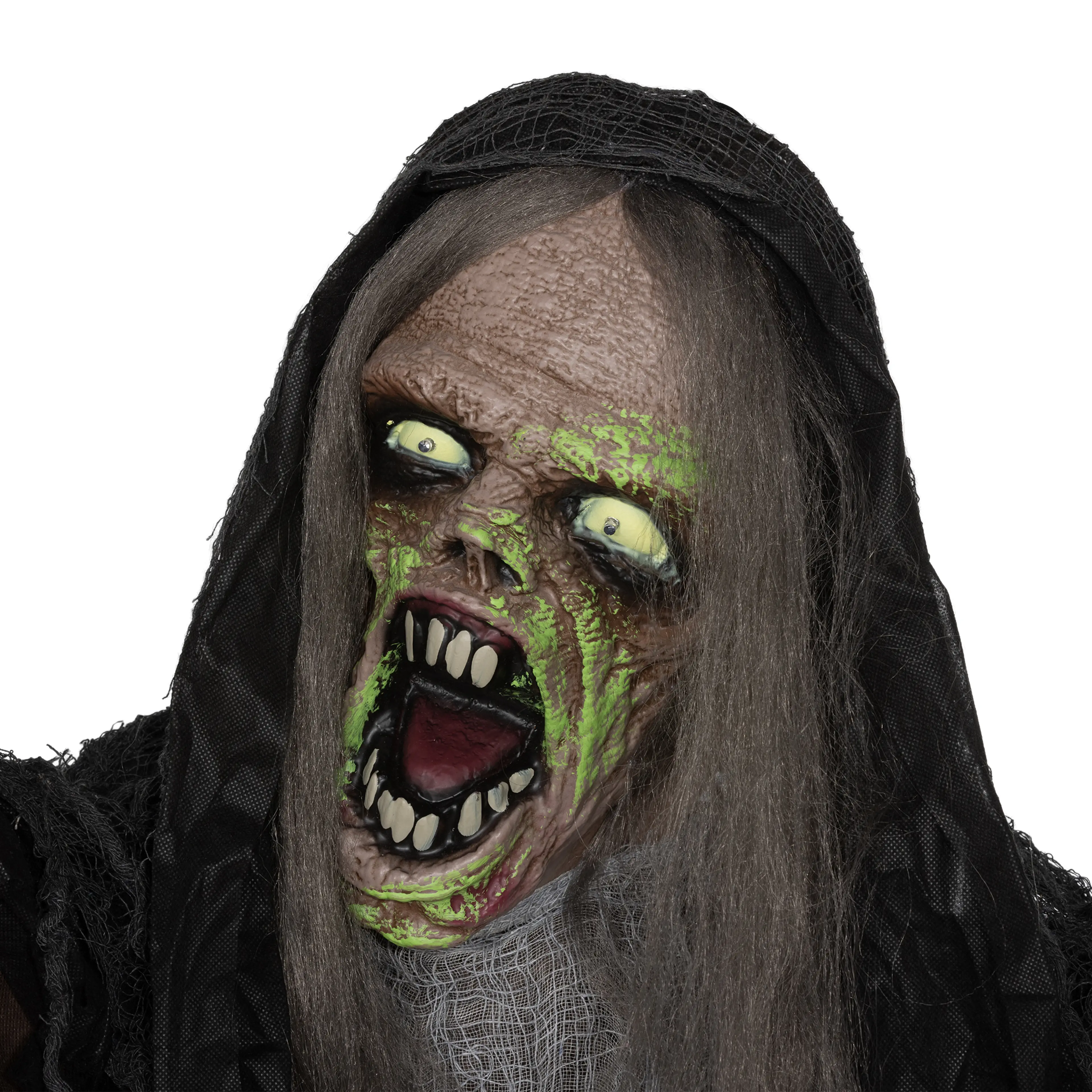 Närbild på figurens gröna monsteransikte med vassa tänder