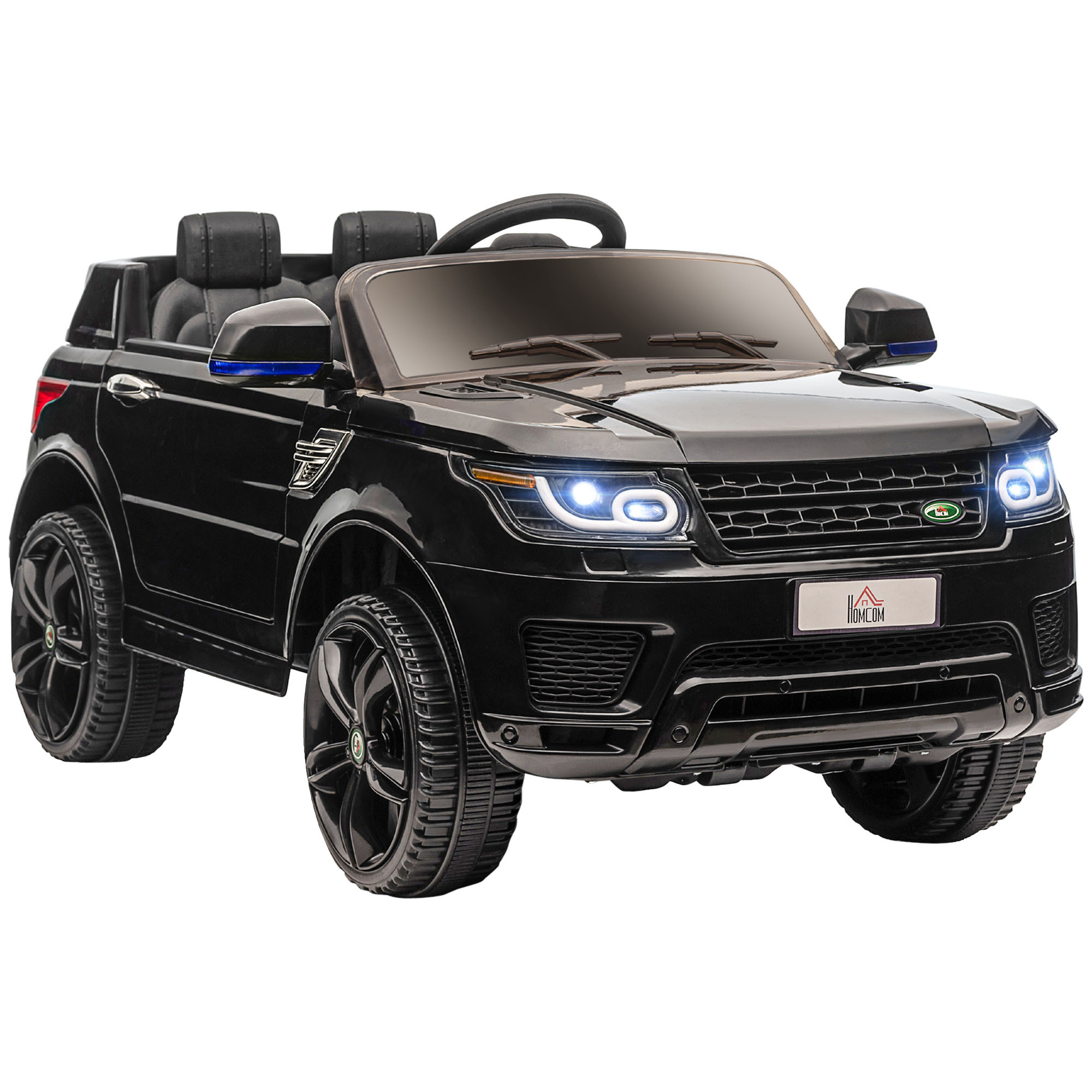 Svart elbil för barn i SUV-modell, 12V, fotograferad snett framifrån på vit bakgrund med tända LED-strålkastare och breda mönstrade hjul.