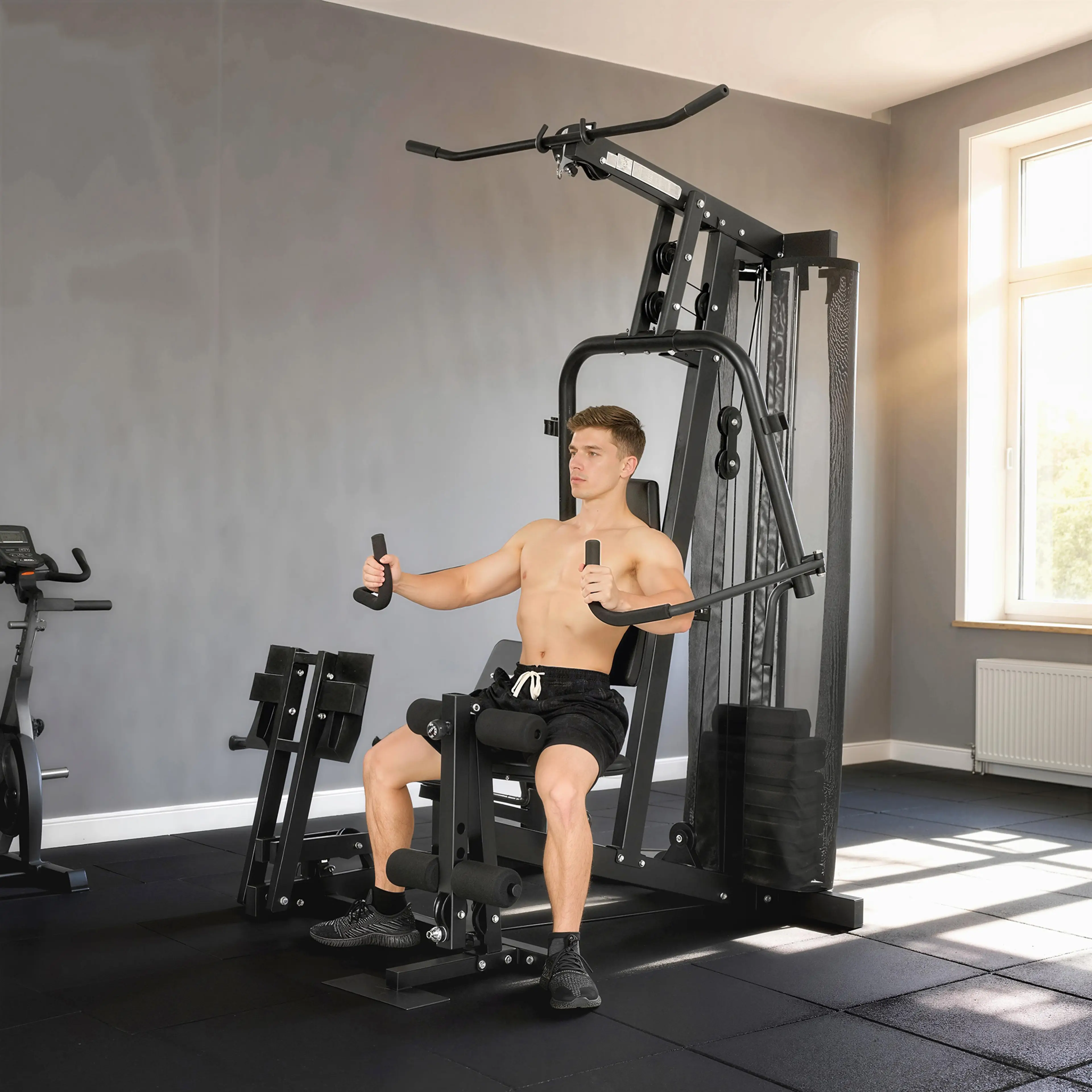 Person som tränar butterfly sittande i gymstationen