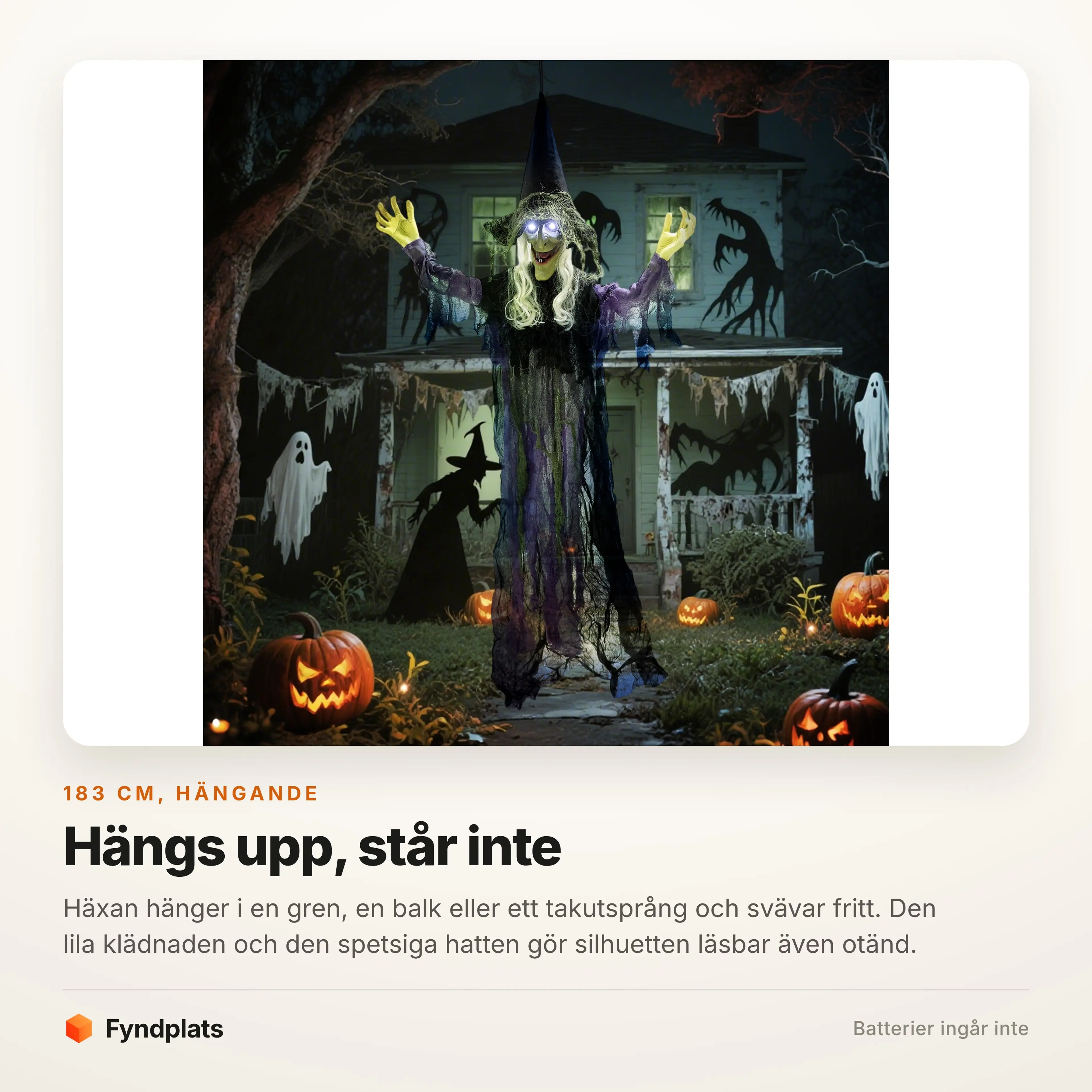 Häxan hänger tänd bland halloweenpynt
