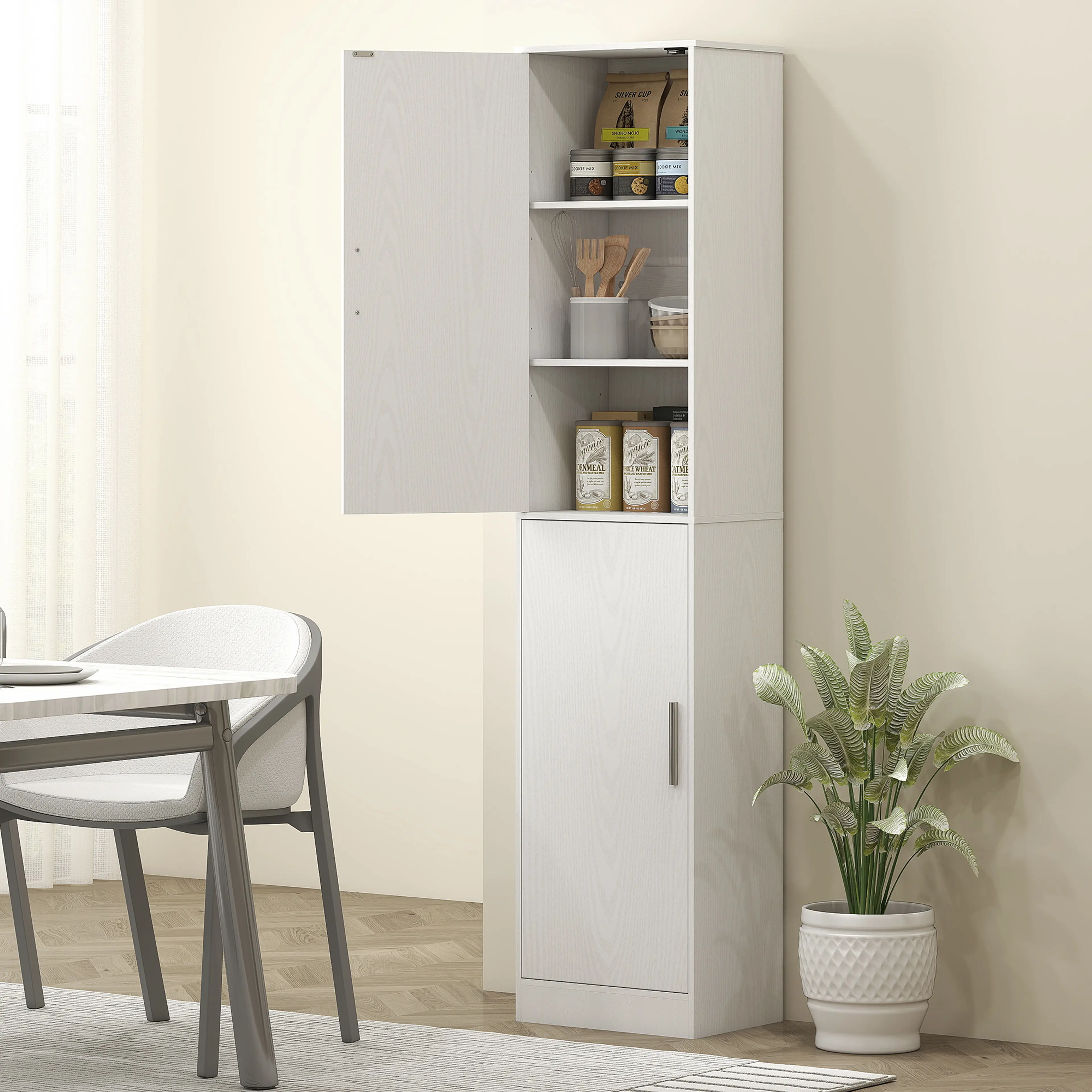 Skåpet använt som förrådsskåp i ett kök med matbord och stolar framför