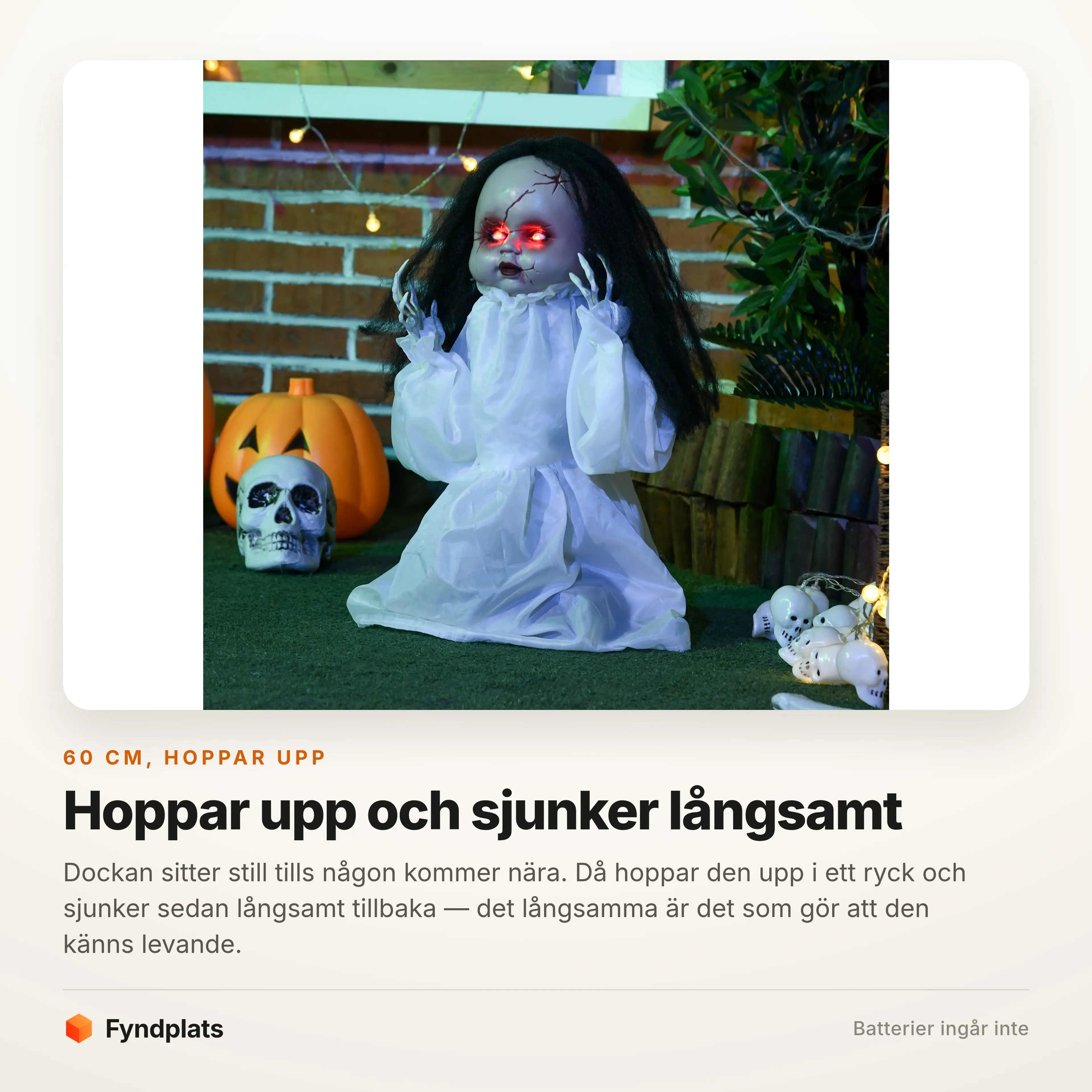 Dockan sitter bland pumpor och dödskallar