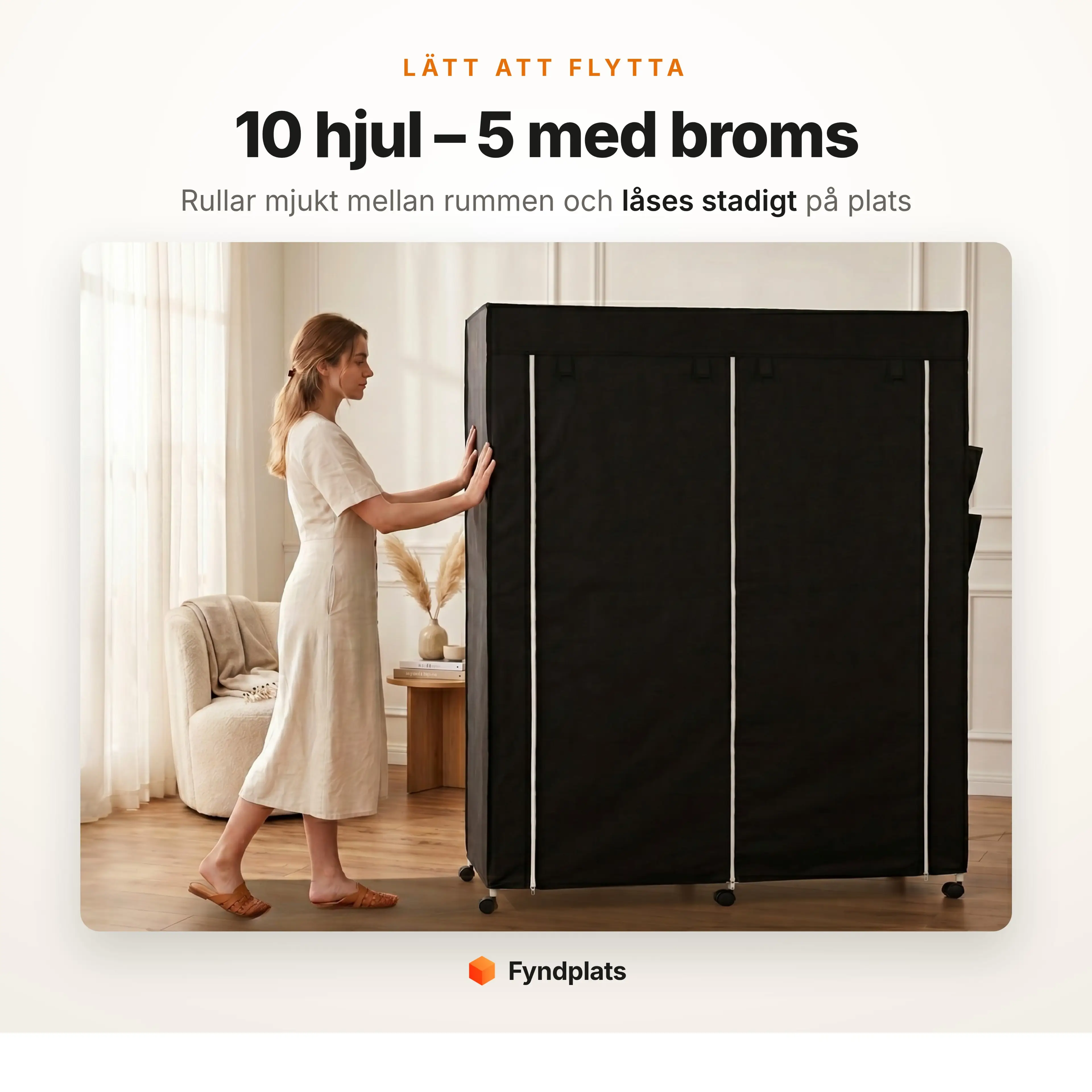 Kvinna rullar den svarta tyggarderoben på sina 10 hjul, varav 5 med broms