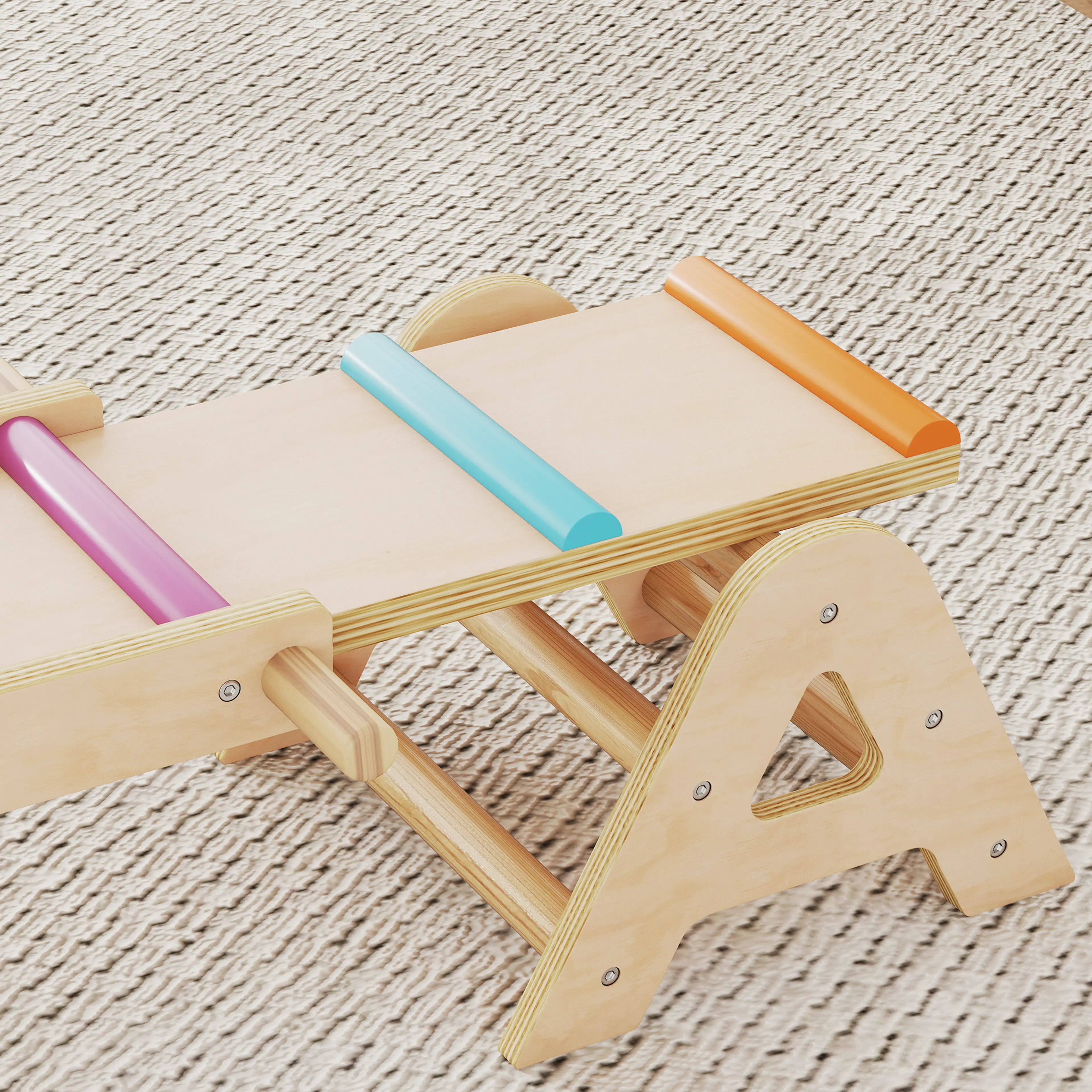 Närbild på brädans ände med färgade ribbor och A-stödet i plywood