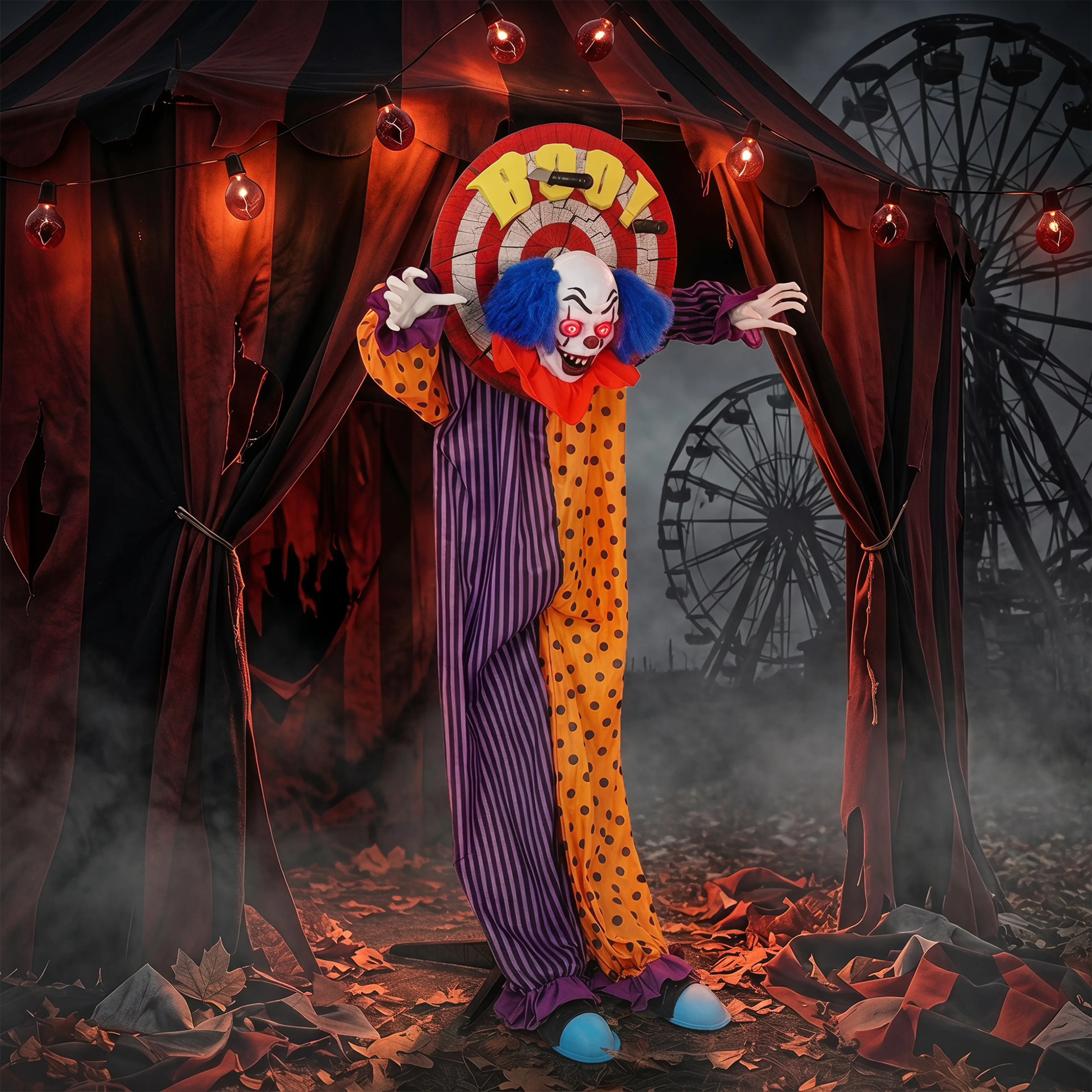 Clownen framför ett cirkustält med pariserhjul bakom