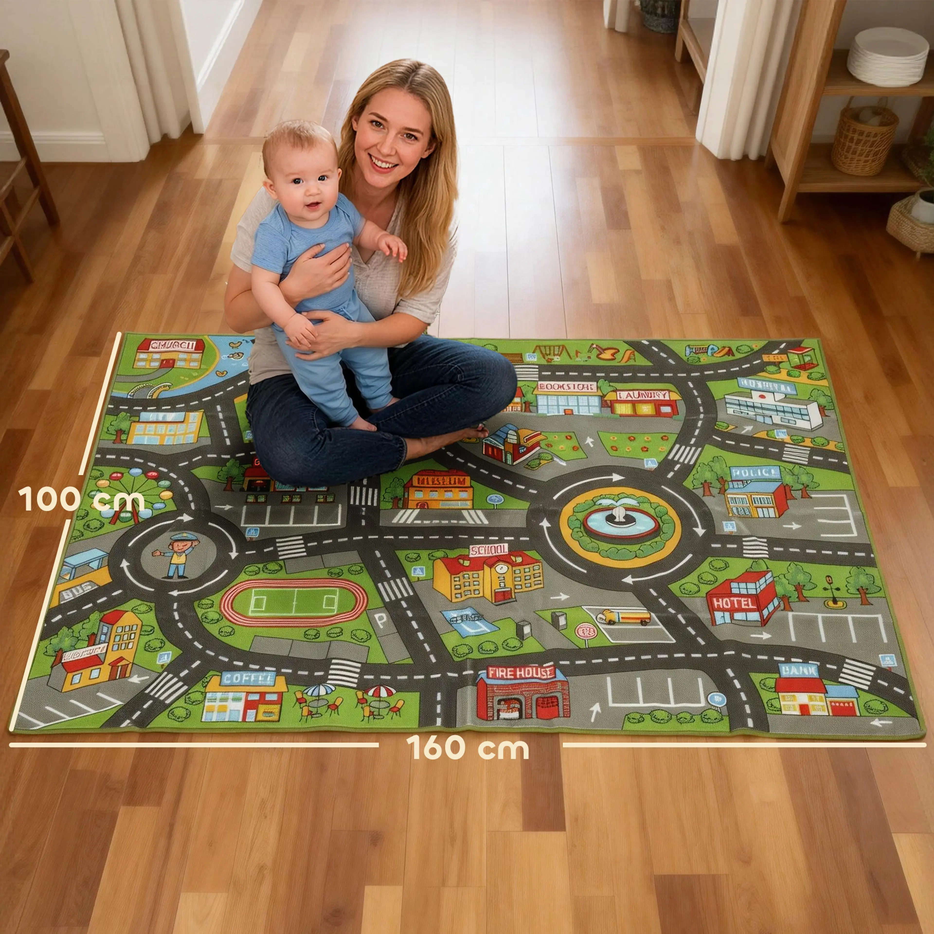 Måttbild som visar lekmattan 160 × 100 cm, med en kvinna och en bebis sittande på den