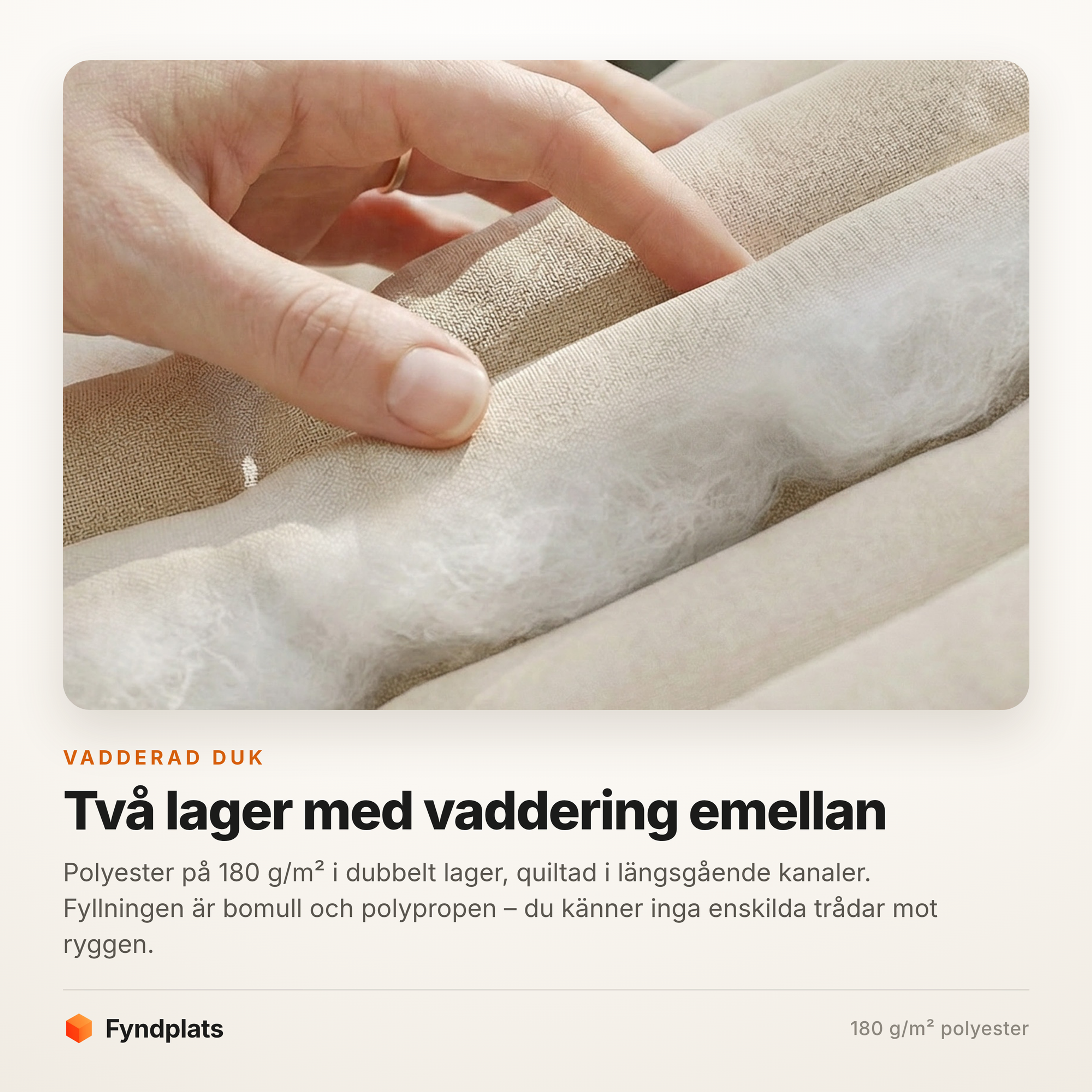 Närbild på dukens två tyglager med vadderingen emellan