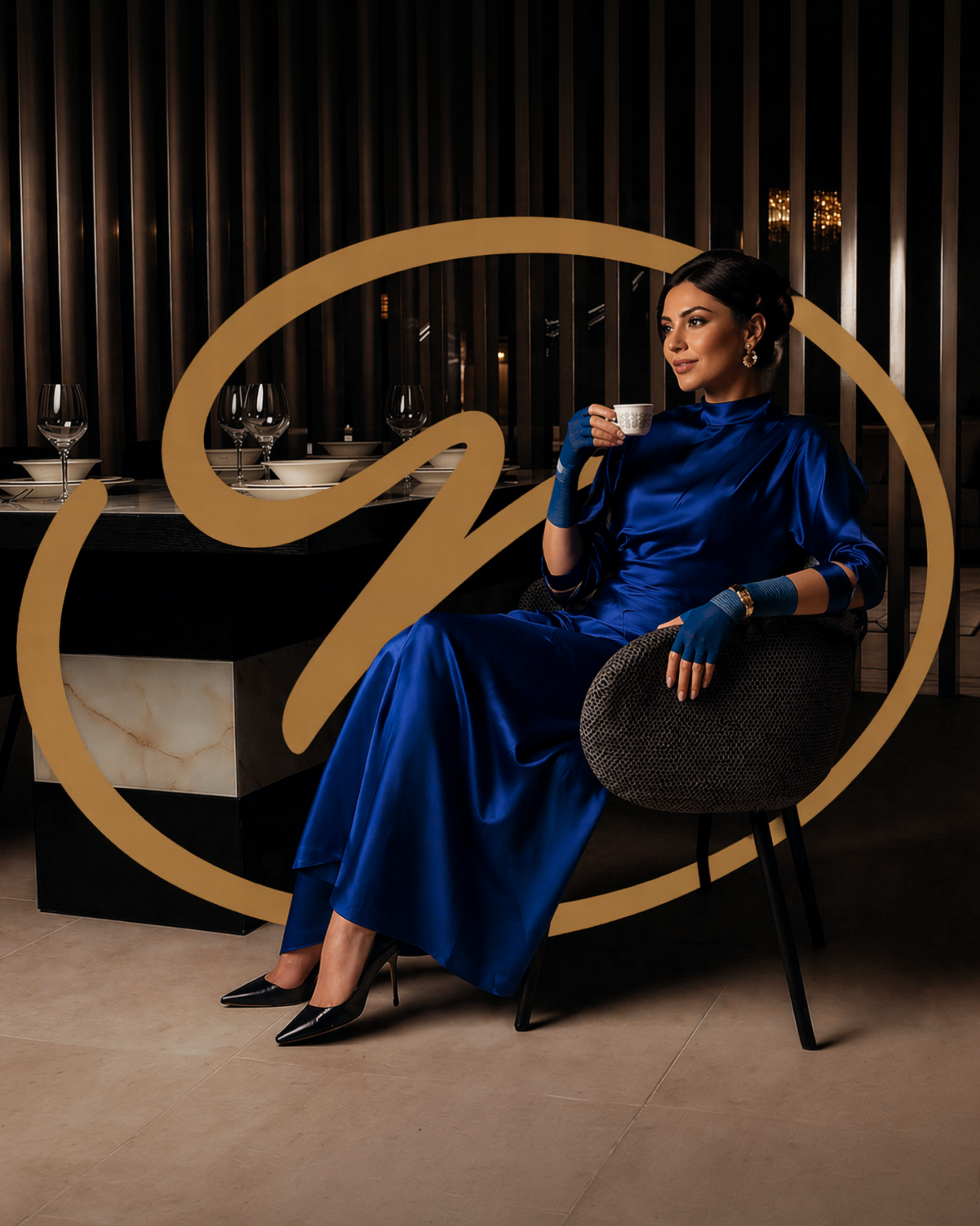Nancy Hassett blue fingerless gloves styled with an evening outfit in supplied campaign artwork
