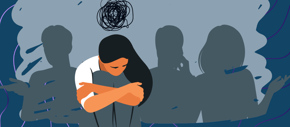 Graphic illustration of a person sitting curled over at a table surrounded by shadowy silhouettes of people in a social setting seen with social anxiety.