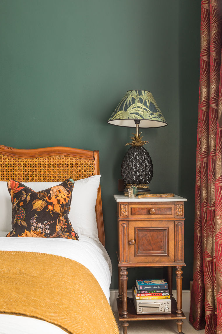 Dark moody green walls, interior design, styling, vintage, table lamps, bedsides, rattan bed