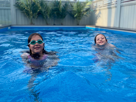 Practicing our treading water in my client's outdoor pool on a beautiful summer day!
