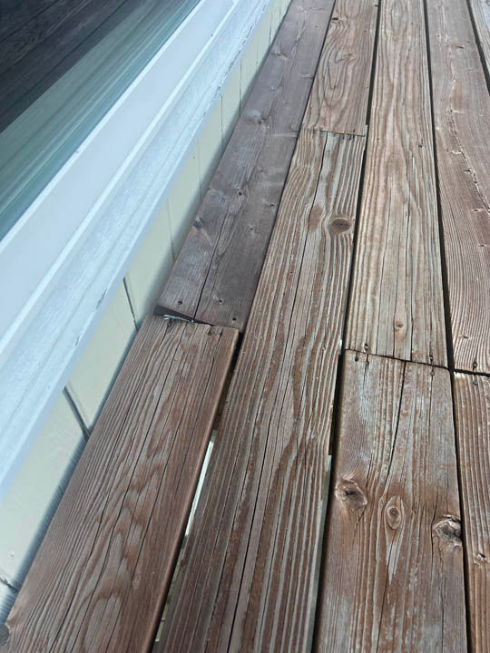 Warped and Split Raised Deck Board