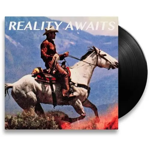 THE STROKES - REALITY AWAITS
