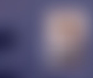 A woman sitting cross-legged on a couch, smiling excitedly at her phone while using a laptop, overlaid on a background of two people planning on a whiteboard with marketing charts and notes.