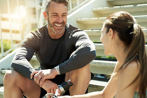 Happy, fitness and couple on break, steps and conversation for exercise in morning, summer