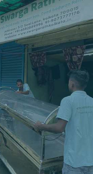 Expert team handling portable dead body freezer box installation with care and professionalism