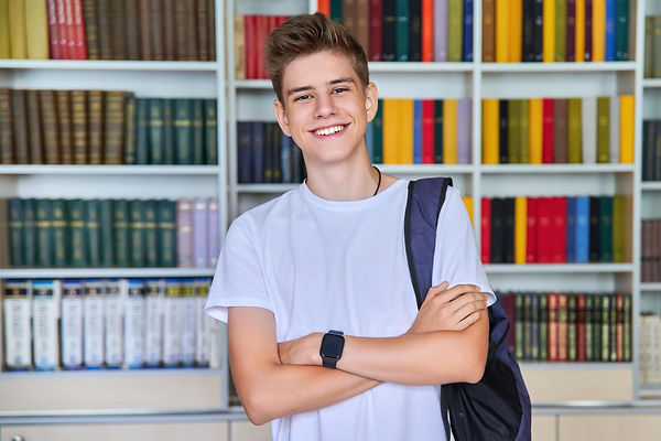 single-portrait-smiling-confident-male-student-teenager-looking-camera-library.jpg