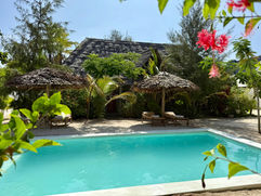 Séjour villa bungalow à Zanzibar avec piscine et climatisation