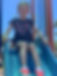Girl at top of slide.jpg