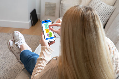 Woman using bObsweep app on mobile device