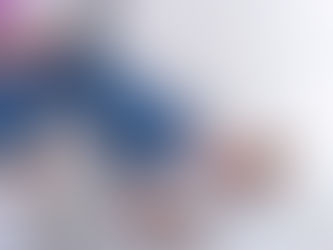 Person using laptop in chair