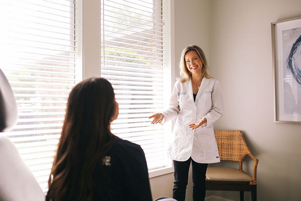 Cosmetic doctor consulting with a patient in an office