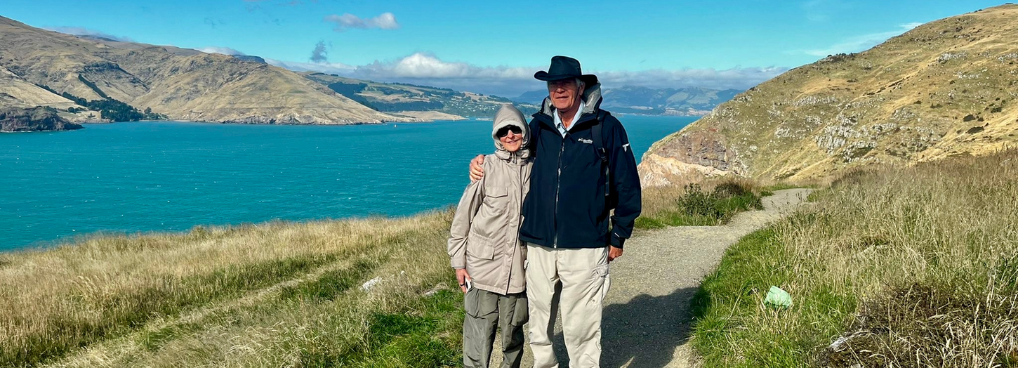 Couple on a guided walking tour near Lyttelton Port in Christchurch New Zealand