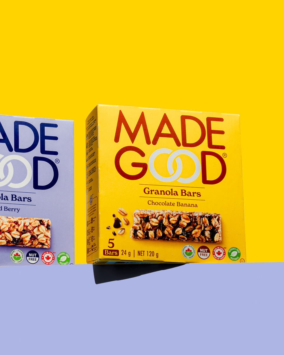 A product photograph of granola bars featuring a vibrant purple and yellow palette, enhancing their personality and bold design.