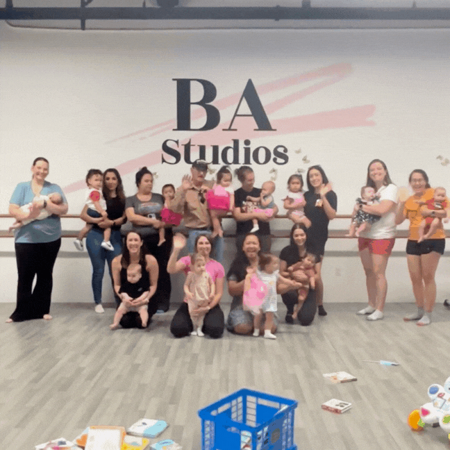 Group waving at camera from a mini movers class