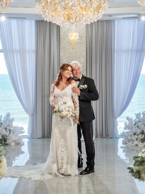 Sally and Eugene having the wedding of their dreams at the World's Most Famous Beach at Ocean Walk.
