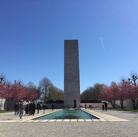 a monuments with trees in bloom
