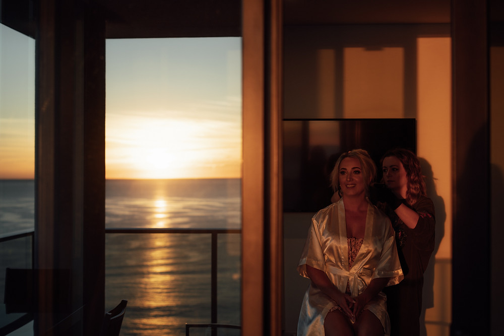 Young bride getting her hair and make up before her wedding in burleigh