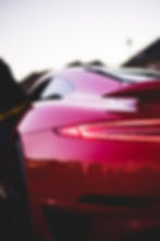 back-view-of-red-porsche-in-street-2025-02-08-22-27-05-utc.jpg