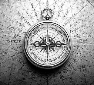 Magnetic old compass on world map. Trave