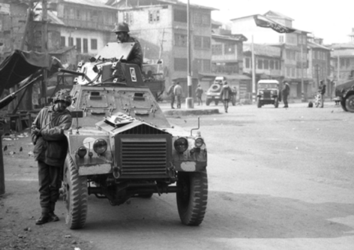 Indian soldiers standing guard one day after the Gowkadal Massacre. January 22, 1990. Photo: Mehraj Din.