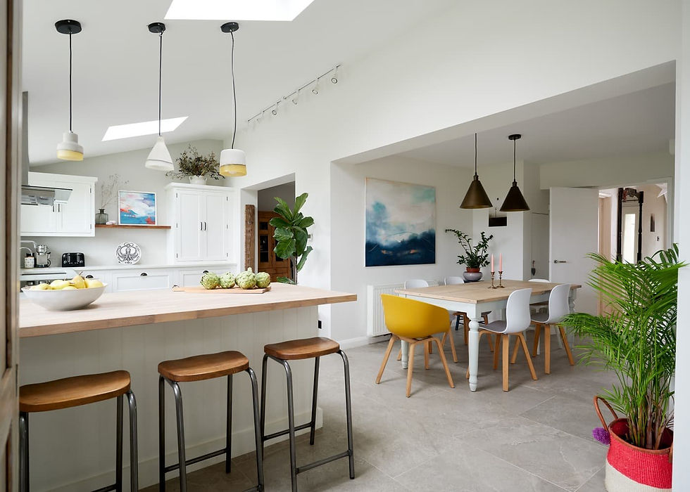 Kitchen extension with modern lighting and wooden furniture