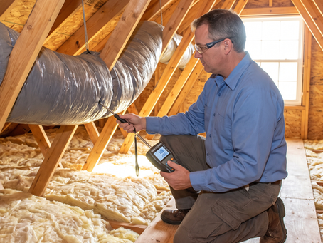 HERO Heating and Air technician testing attic airflow for AC duct repair in Mount Pleasant SC.