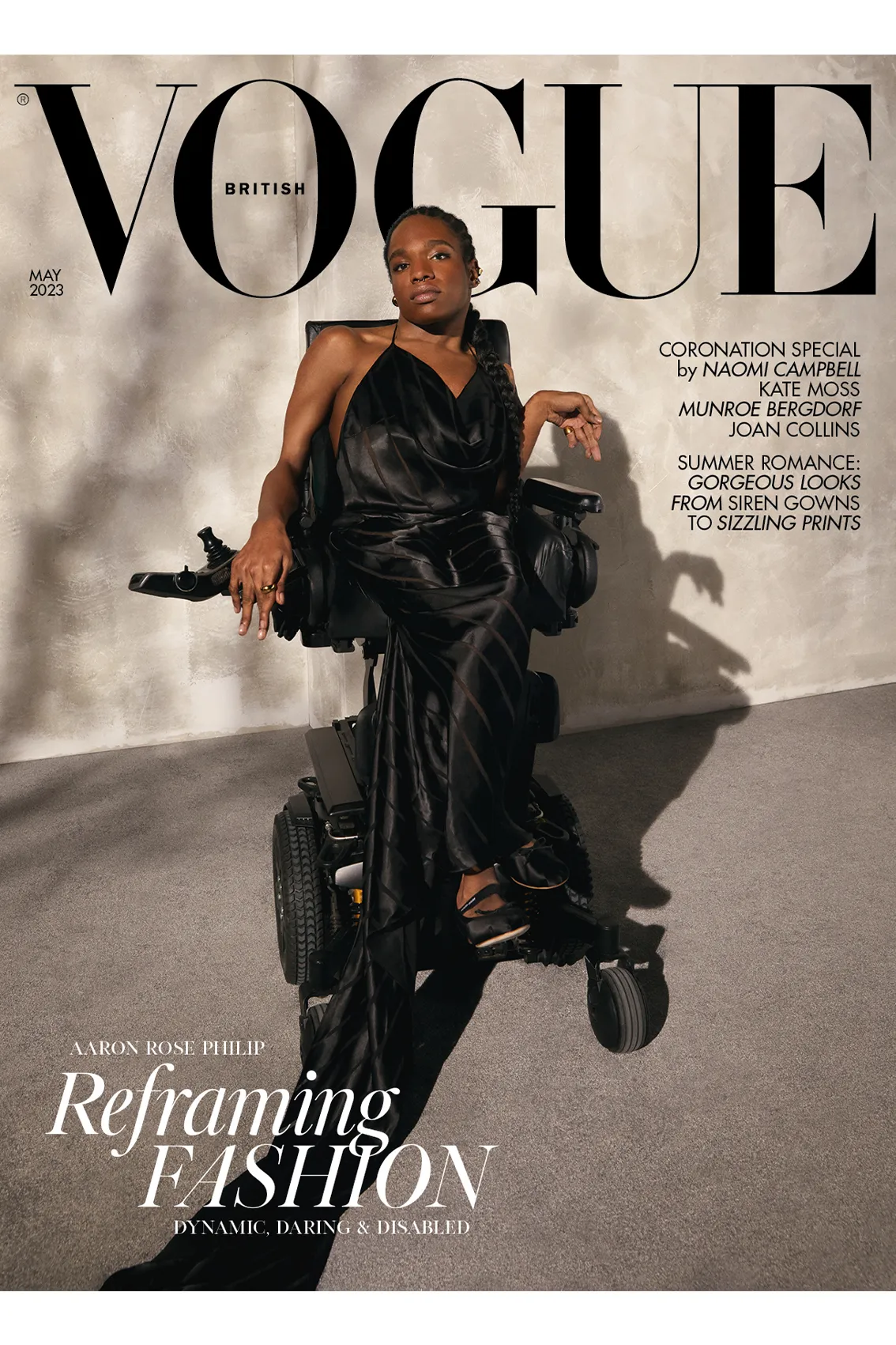 Aaron Philip, a black transgender woman in a wheelchair posing for the cover of vogue in a long black dress