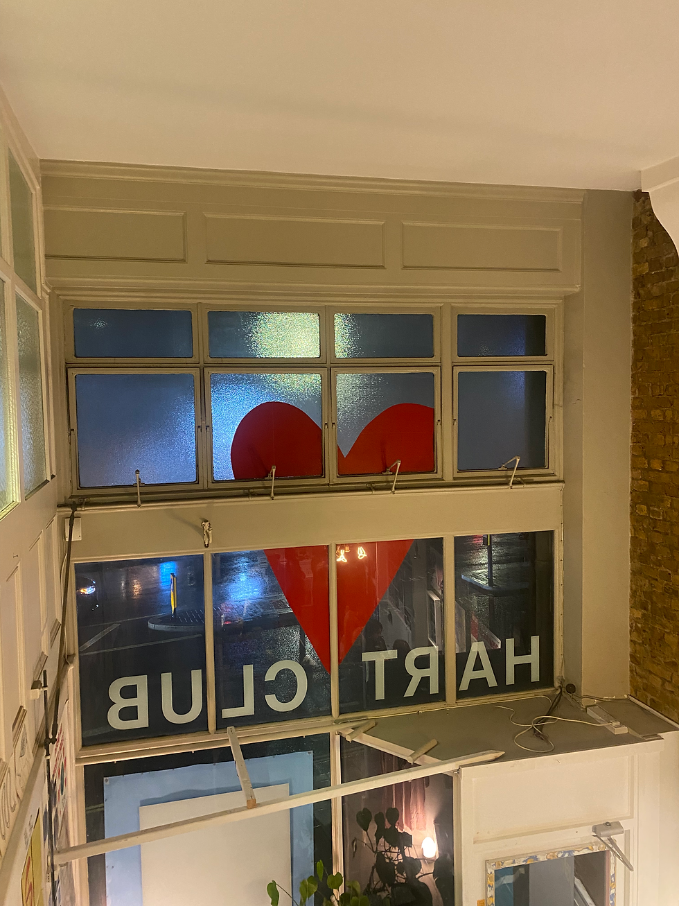 the entrance to Hart Club, which says the name across the windows with a big red heart above