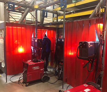 Students learning GTAW welding in the Training Academy welding lab