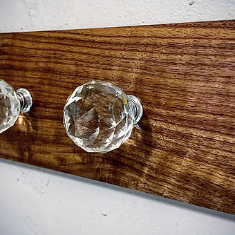 Walnut and crystal towel rack