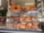 Our cabinet full of gorgeous pastries, scones, bagels and muffins