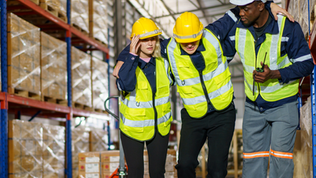 injured worker being helped