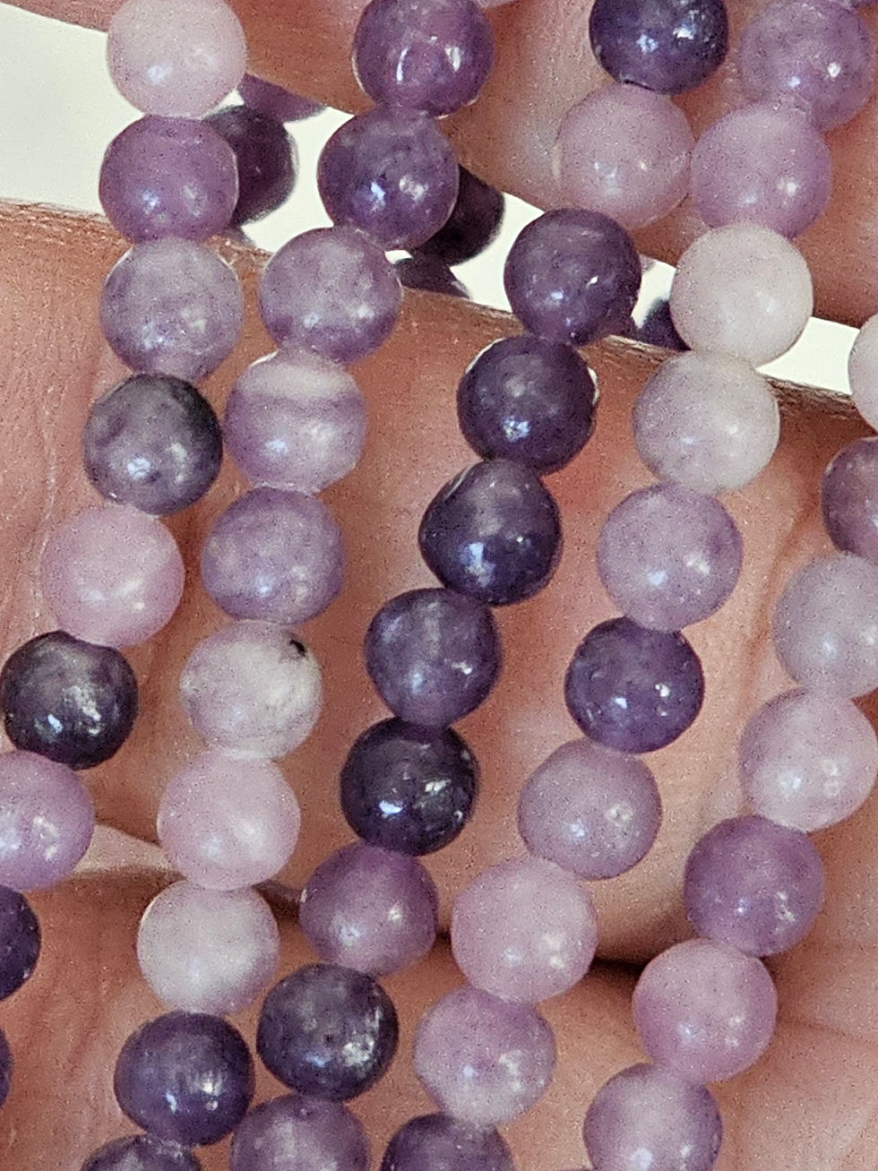 A soft and soothing bracelet made with 4mm natural Lepidolite beads to ease stress, support emotional healing, and gently release what no longer serves.